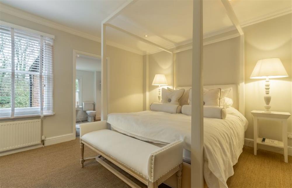 Tide Cottage: Master bedroom with king-size bed is simply gorgeous at Tide Cottage, Overstrand near Cromer