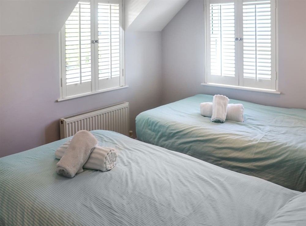 Twin bedroom at Tideglass in Penally, near Tenby, Dyfed