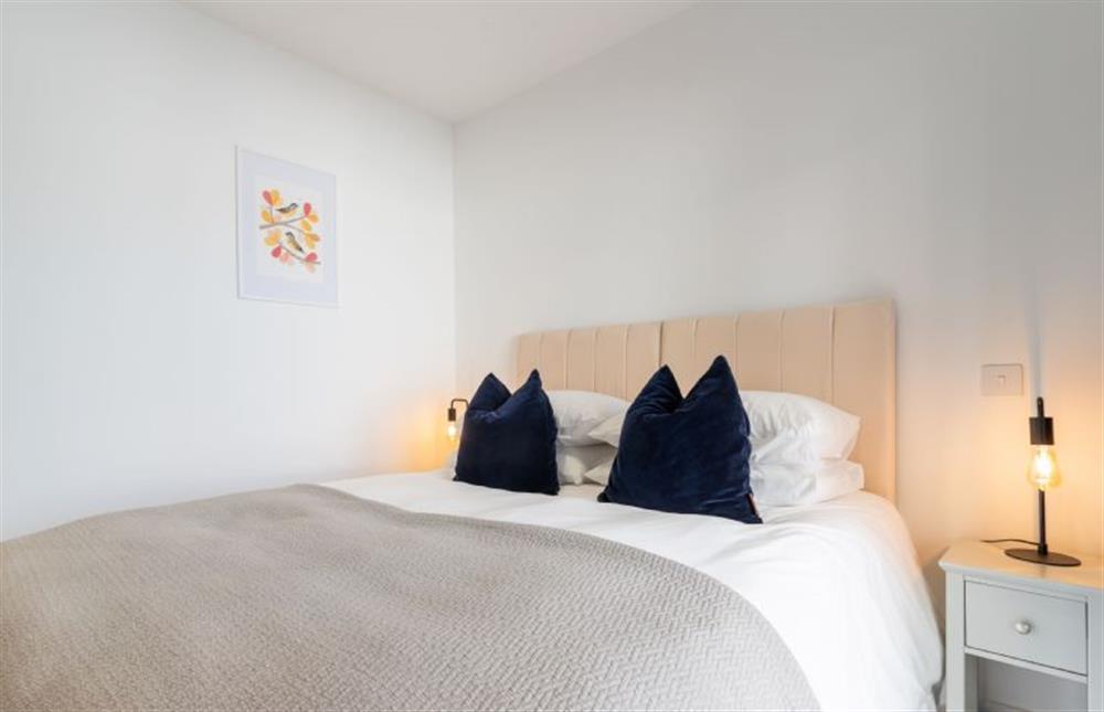 The bed in bedroom one can convert into twin single beds upon request at Tidelines, Newquay