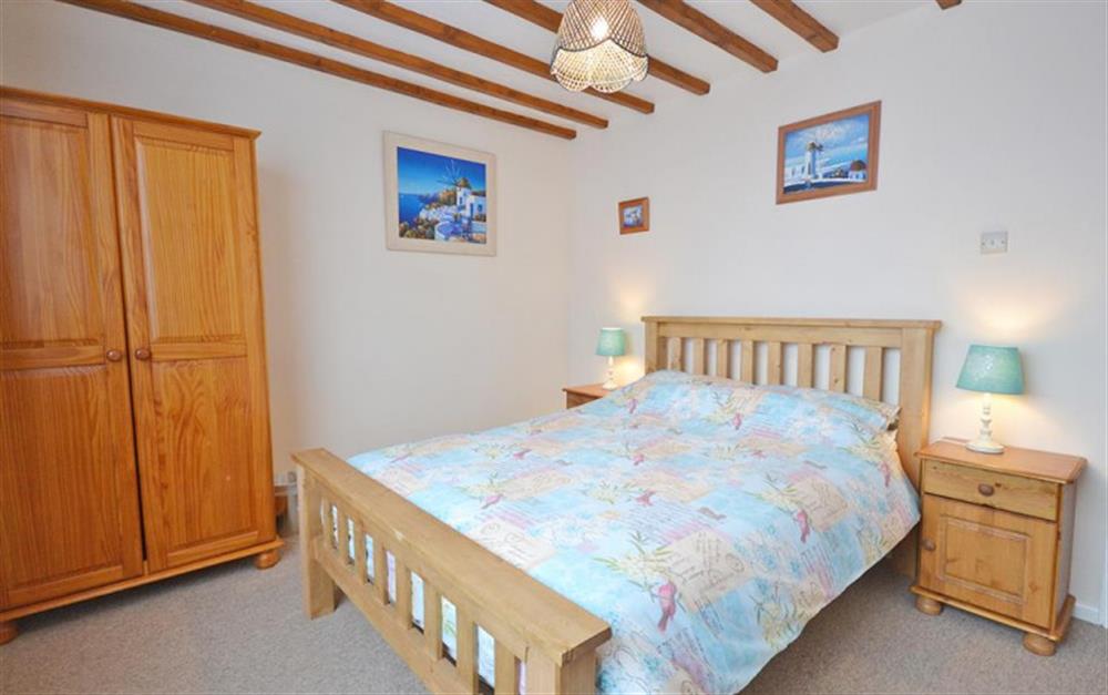 The comfortable master bedroom. at Tideways Apartment in Looe