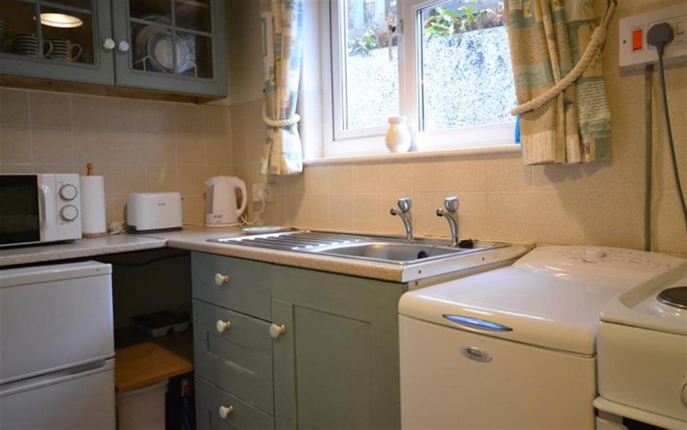 The compact well equipped pretty kitchen. at Tideways Apartment in Looe
