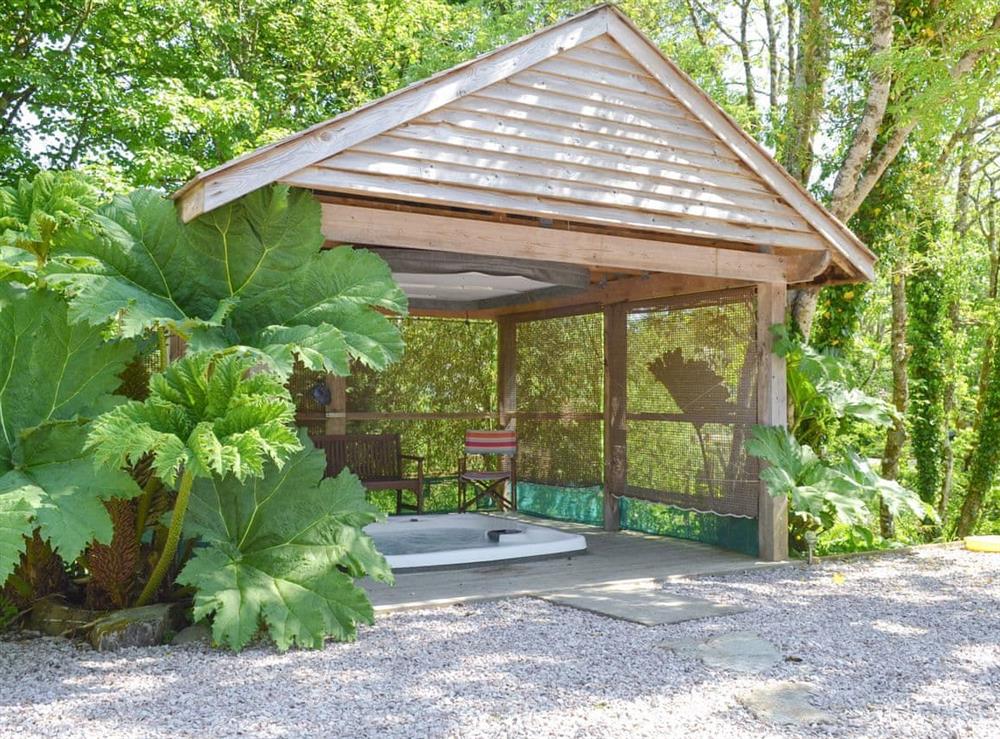 Quirky hot tub enclosure within the garden area at Tigh A Vullin in Lochgilphead, Argyll