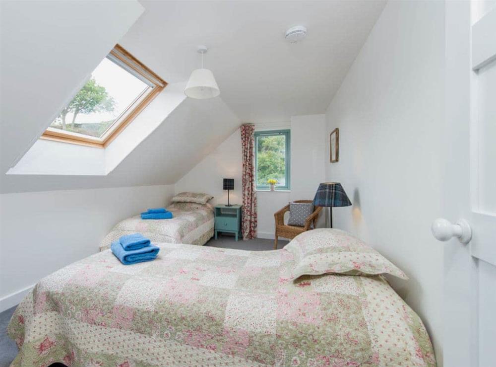 Cosy and light twin bedroom with built in wardrobe at Tigh An Iasgair in Fearnbeg, near Applecross, Ross-Shire