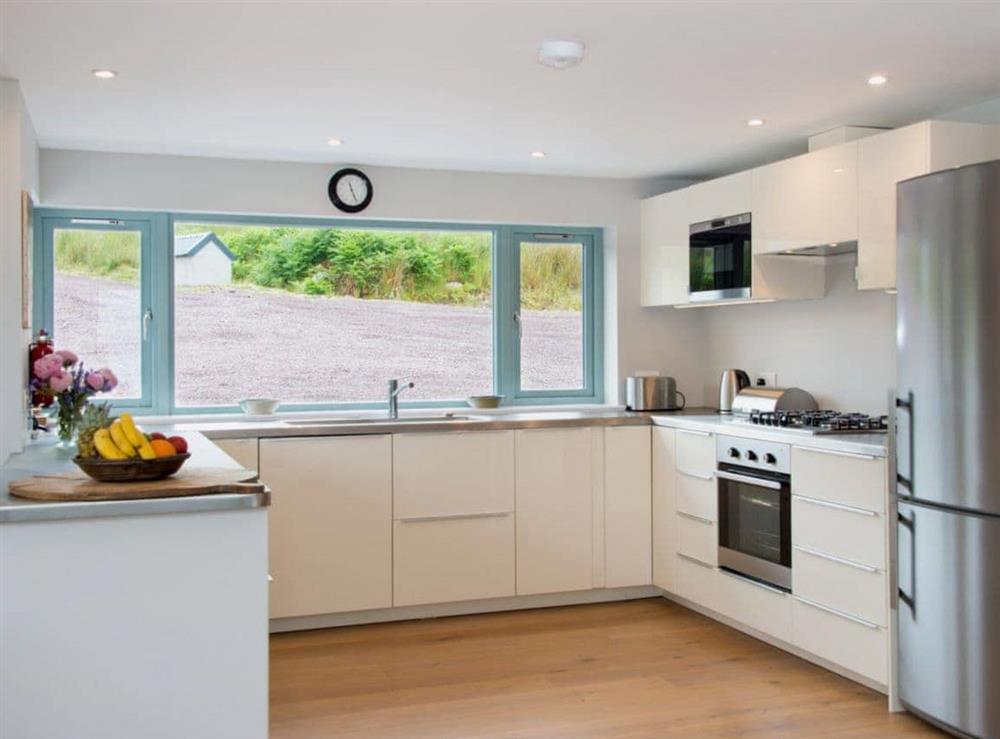 Large, well equipped (oven, microwave, fridge freezer, dishwasher) and modern kitchen with oak wooden floors. at Tigh An Iasgair in Fearnbeg, near Applecross, Ross-Shire