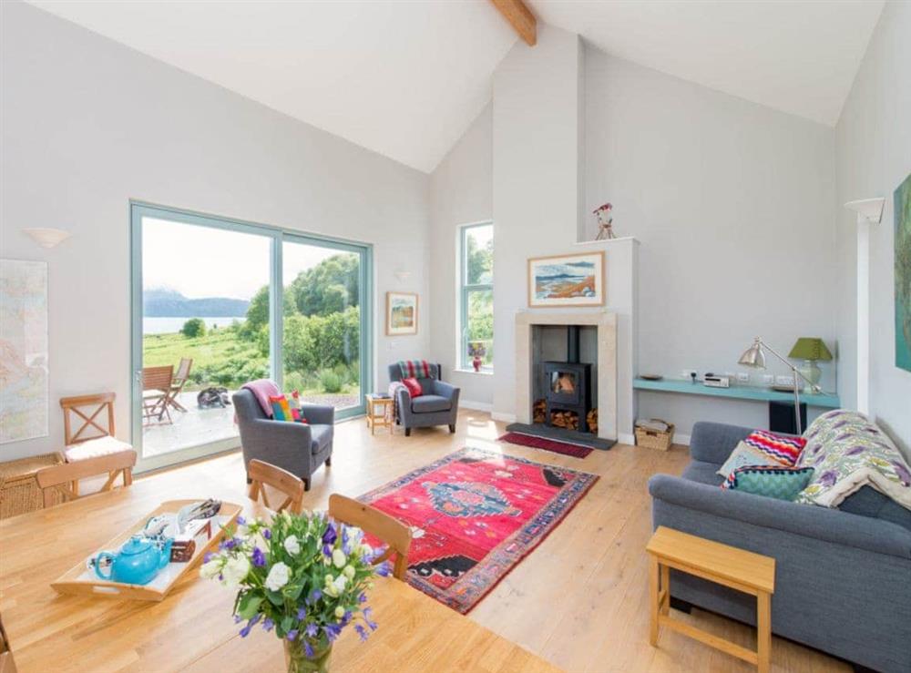 View of open plan living room from kitchen. Light, space and warmth radiates throughout the house at Tigh An Iasgair in Fearnbeg, near Applecross, Ross-Shire