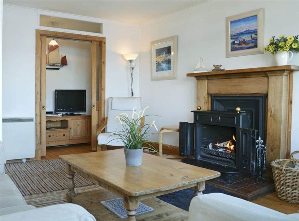Homely living room with wood burner at Tigh an Uillt in Strachur, near Inveraray, Argyll