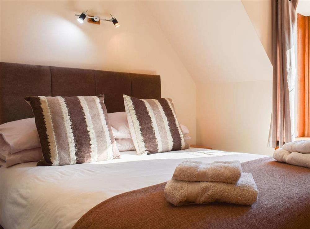 Welcoming double bedroom at Little Tigh Craggan, 