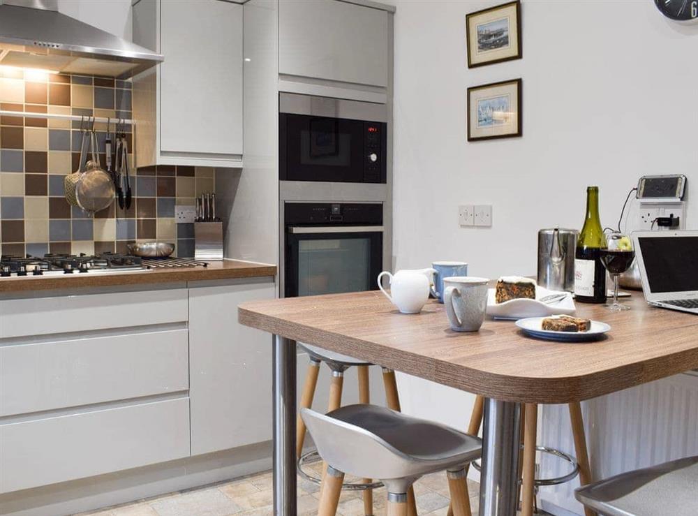 Modern kitchen with informal dining area at Tigh Raineach in Strathyre, Callander, Perthshire