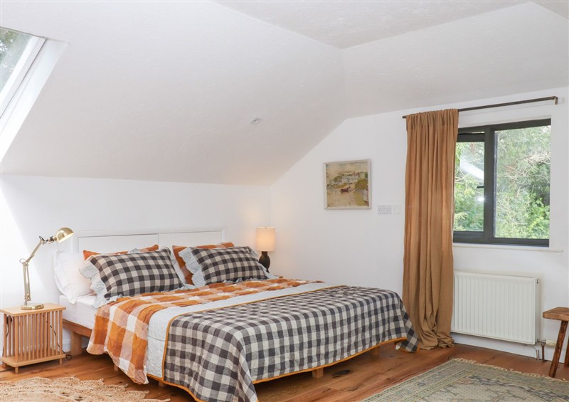 A bedroom in Tigley Meadow Coach House at Tigley Meadow Coach House, Dartington