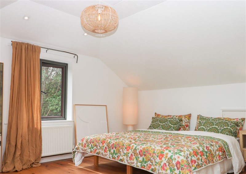 One of the bedrooms at Tigley Meadow Coach House, Dartington