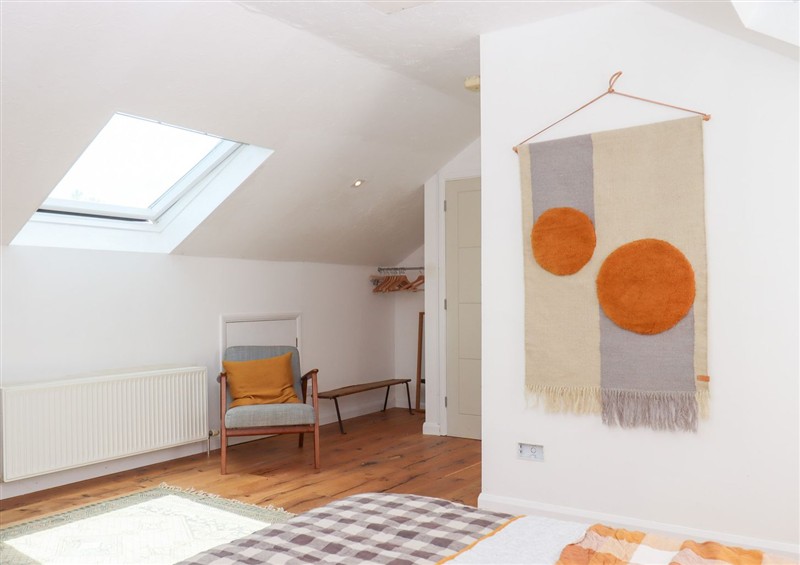 This is a bedroom at Tigley Meadow Coach House, Dartington