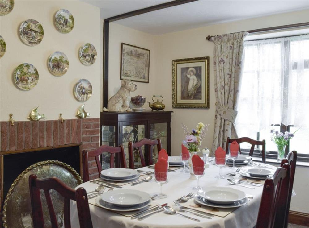 Elegant dining room at Tillet Cottage in Oulton Broad, near Lowestoft, Suffolk