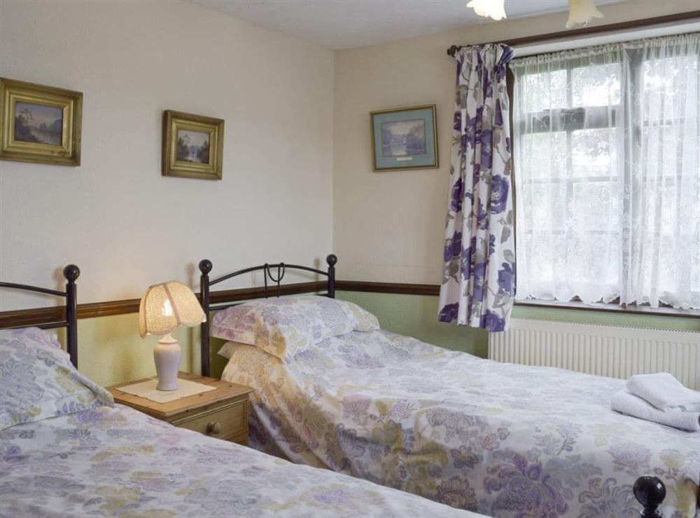 Light and airy twin bedroom at Tillet Cottage in Oulton Broad, near Lowestoft, Suffolk