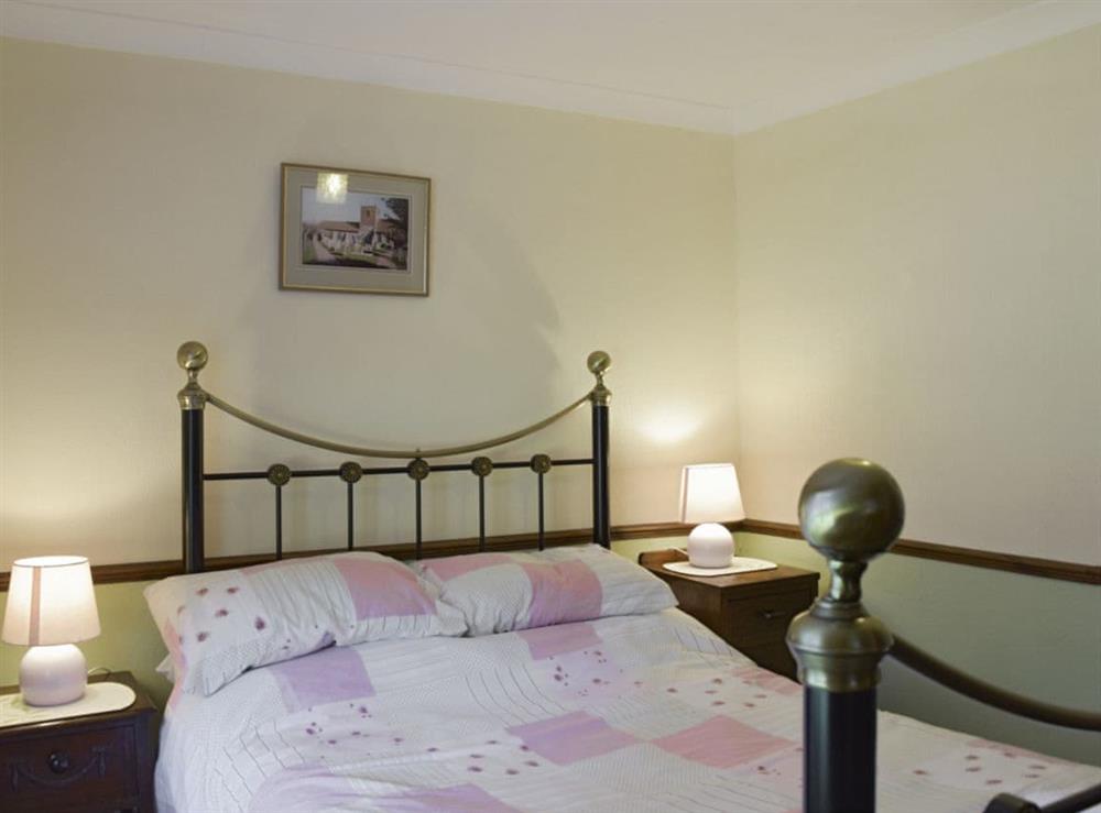 Restful second double bedroom at Tillet Cottage in Oulton Broad, near Lowestoft, Suffolk