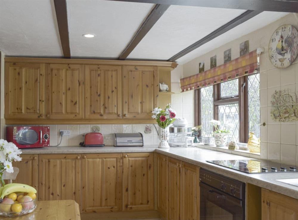Well-equipped fitted kitchen at Tillet Cottage in Oulton Broad, near Lowestoft, Suffolk