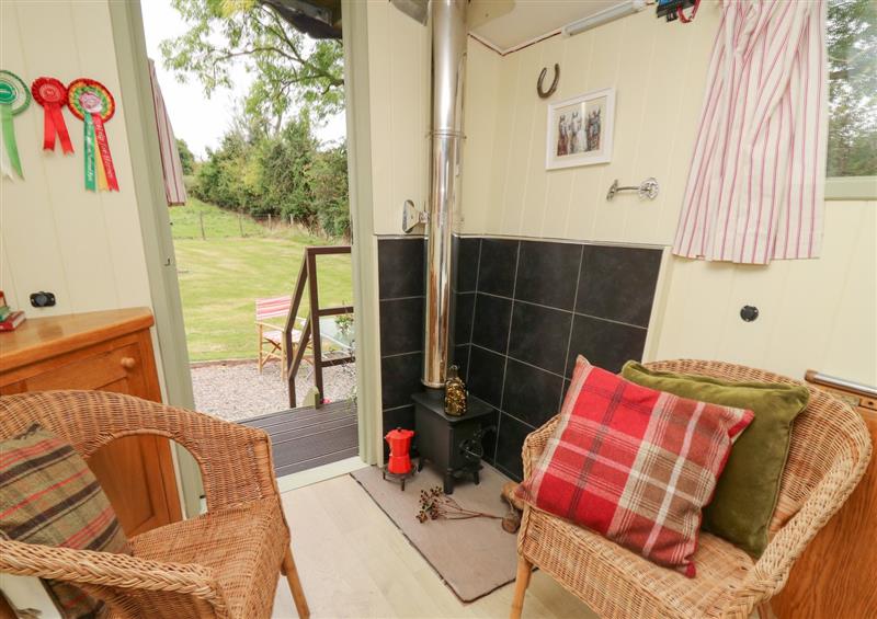 Enjoy the living room at Tilly Gypsy-style Caravan Hut, Llangorse