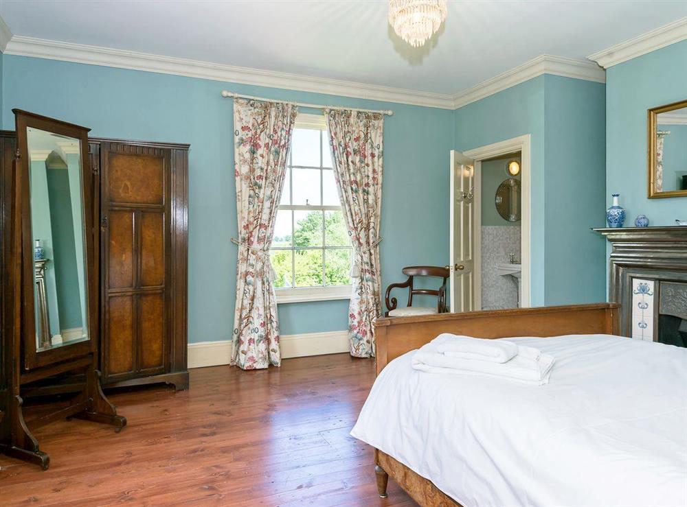Double bedroom with lots of character at Tilney Hall in Kings Lynn, Norfolk
