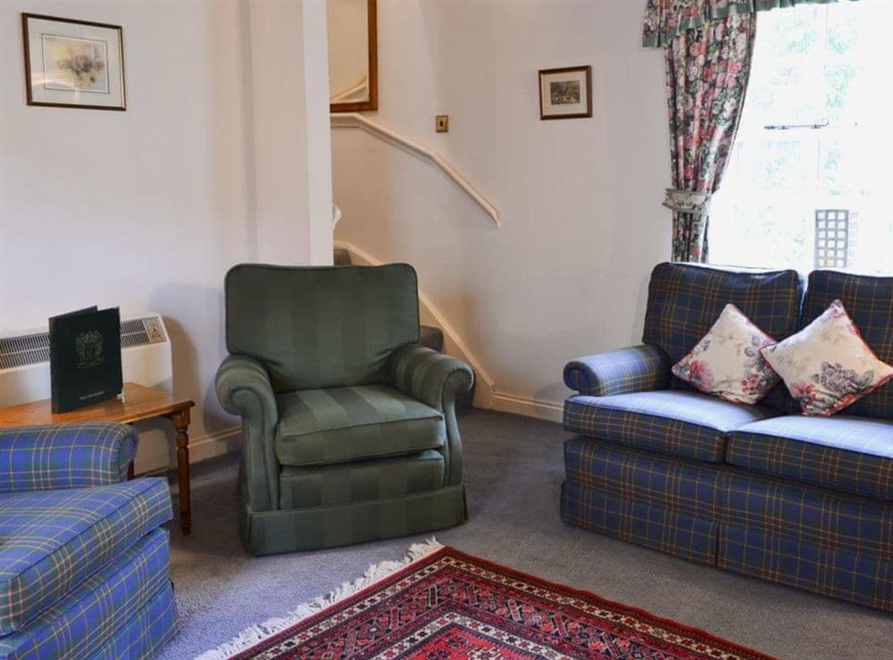 Living room with ornamental period range (photo 2) at Timberwick Green in Akeld, Wooler, Northumberland., Great Britain