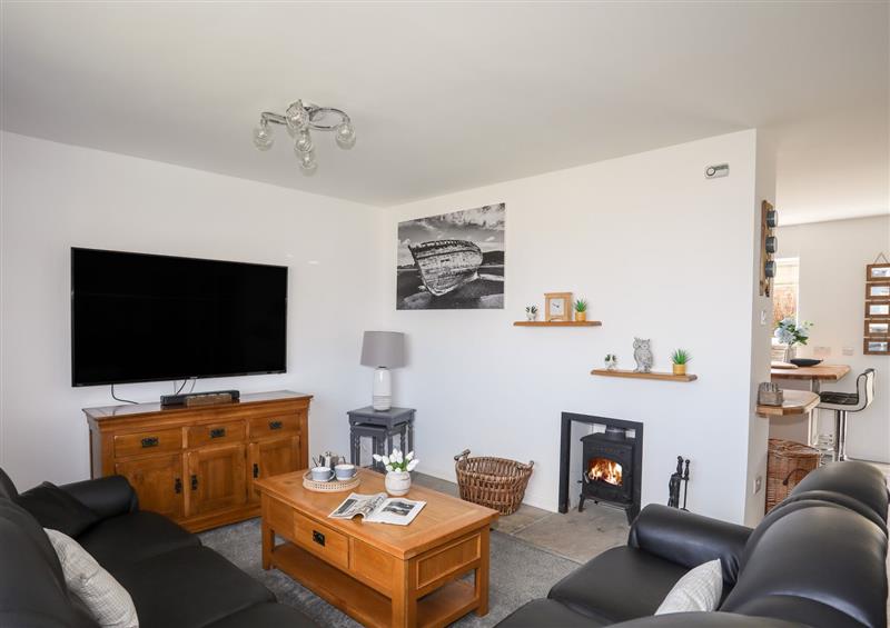 This is the living room at Tinkers Patch, Benllech