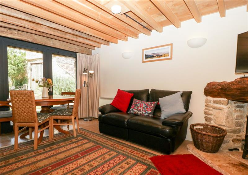 Relax in the living area at Tinkley Cottage, Nympsfield near Nailsworth