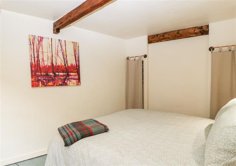 A bedroom in Tinmans Cottage at Tinmans Cottage, Lydbrook