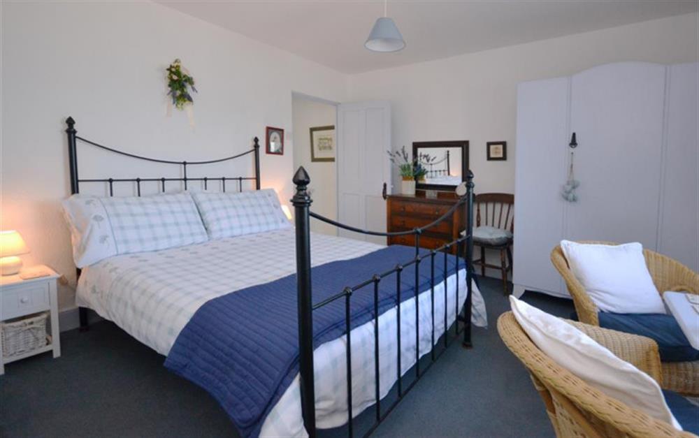 The double bedroom with sea views. at Tinsey Cottage in Beesands