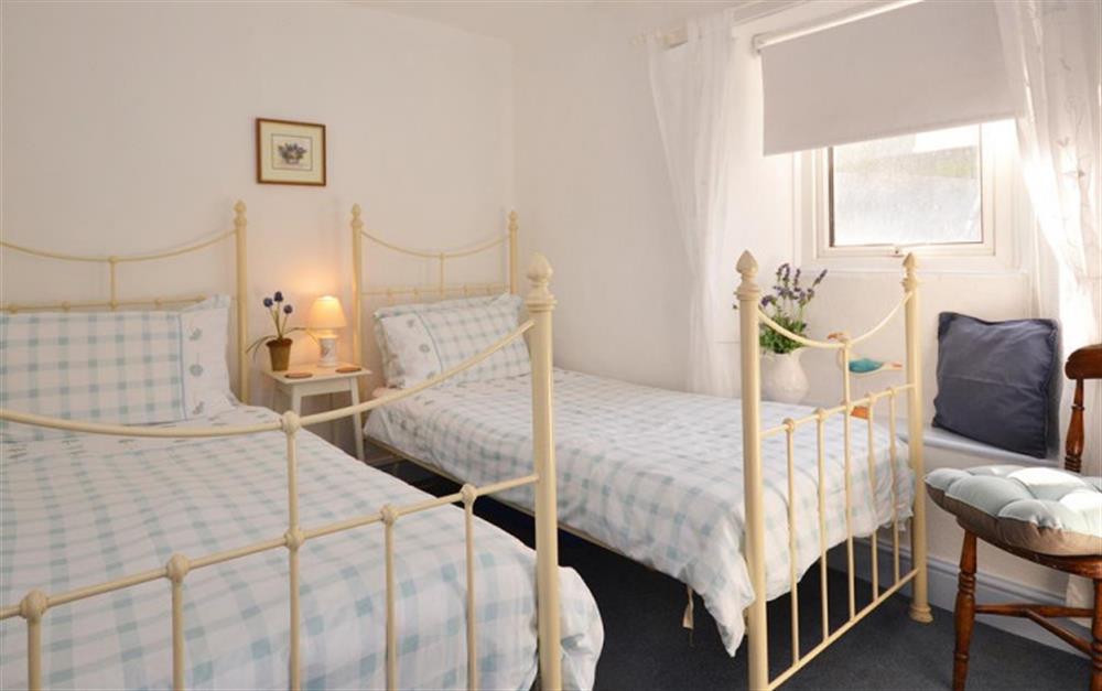 The twin bedroom with 3ft single beds. at Tinsey Cottage in Beesands