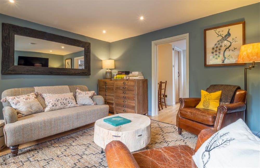 Sitting room with comfortable seating at Tipple Cottage, Peasenhall