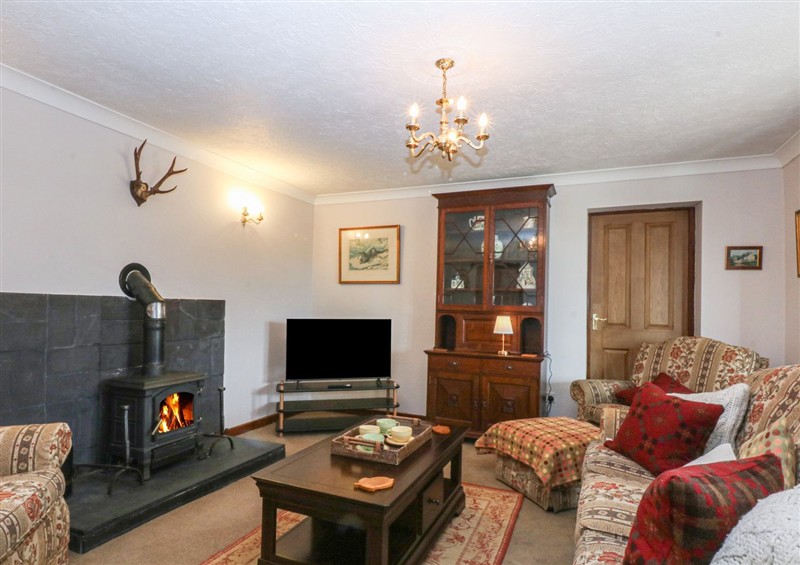 Relax in the living area (photo 2) at Tir Mawr, Niwbwrch (newborough)