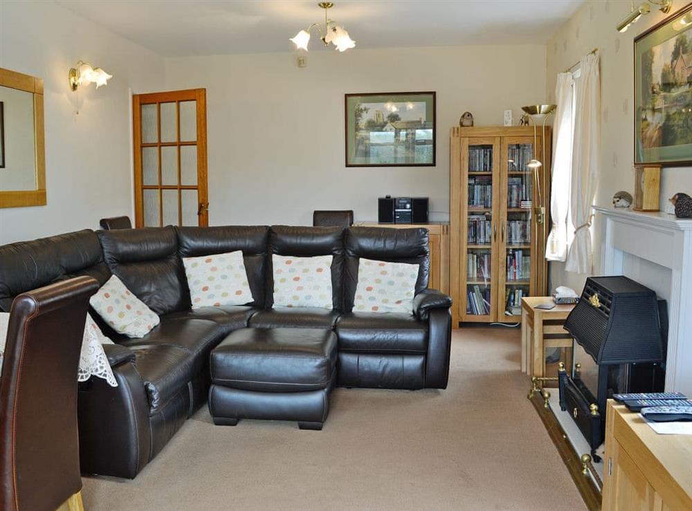 Welcoming living/dining room (photo 2) at Tir Nani Ogg in Towyn, near Rhyl, Conwy