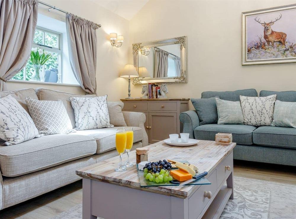 Comfortable seating within living area at Tissington Ford Barn in Bradbourne, Derbyshire