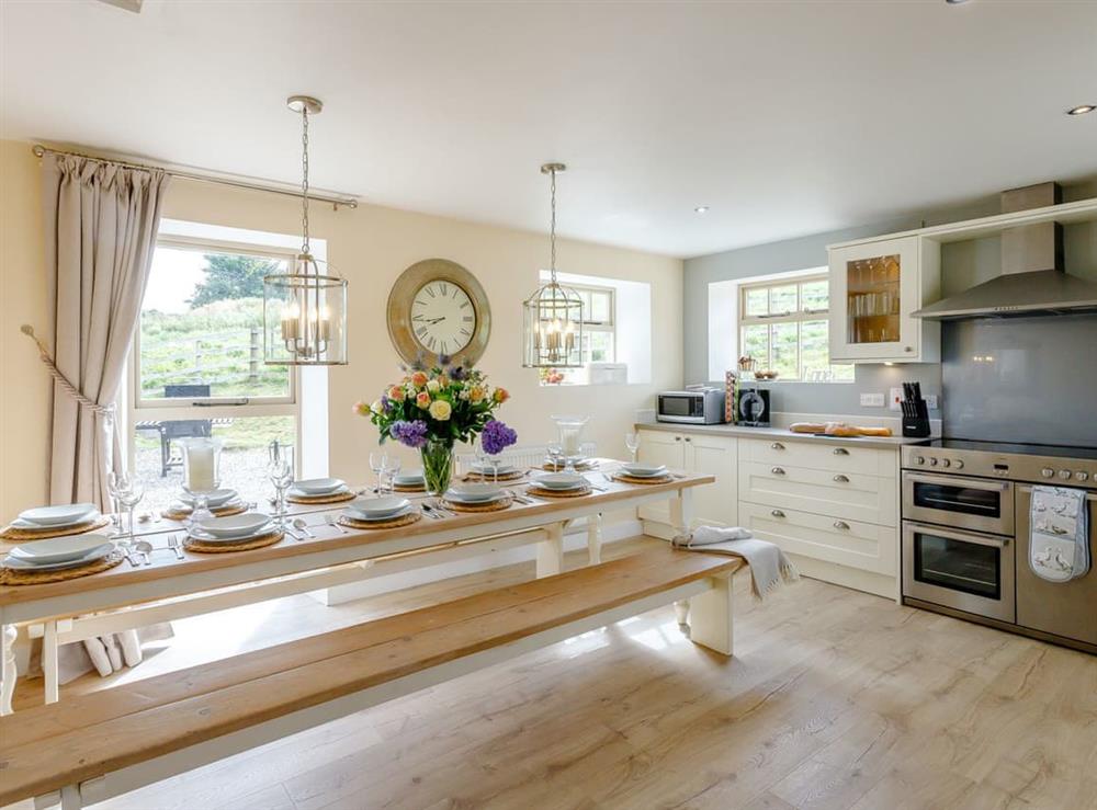 Fully equipped kitchen with dining area at Tissington Ford Barn in Bradbourne, Derbyshire