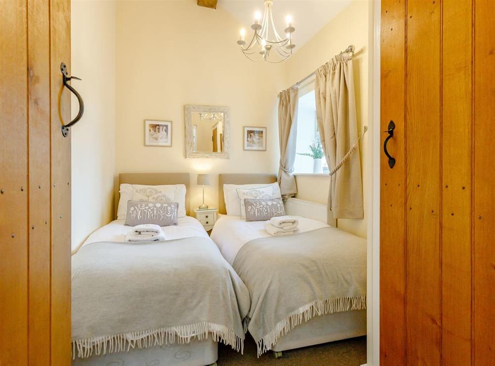 Inviting twin bedroom at Tissington Ford Barn in Bradbourne, Derbyshire
