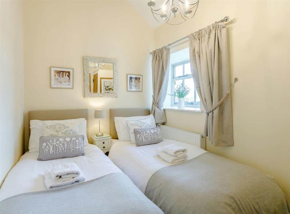 Light and airy twin bedroom at Tissington Ford Barn in Bradbourne, Derbyshire