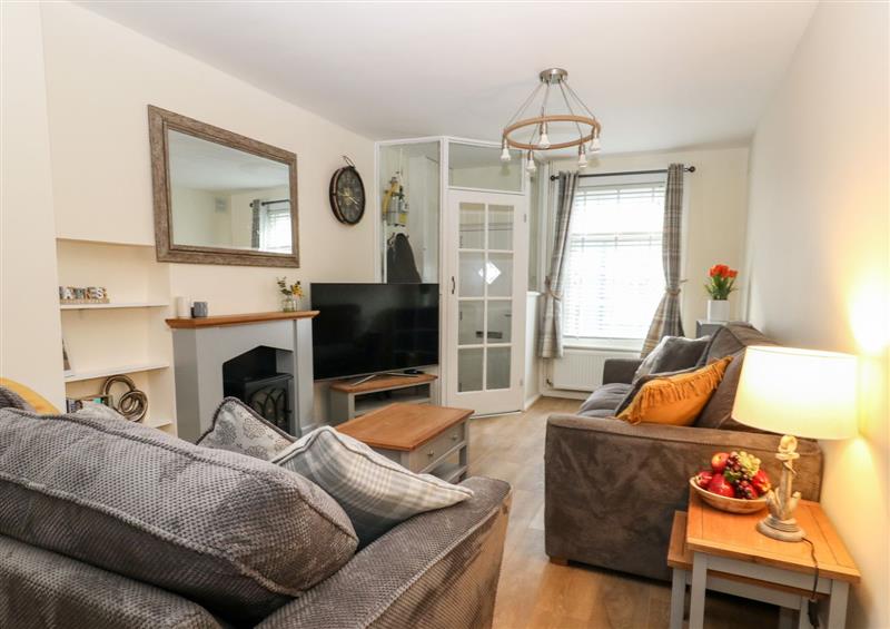 Relax in the living area at Tivolli Cottage, Weymouth
