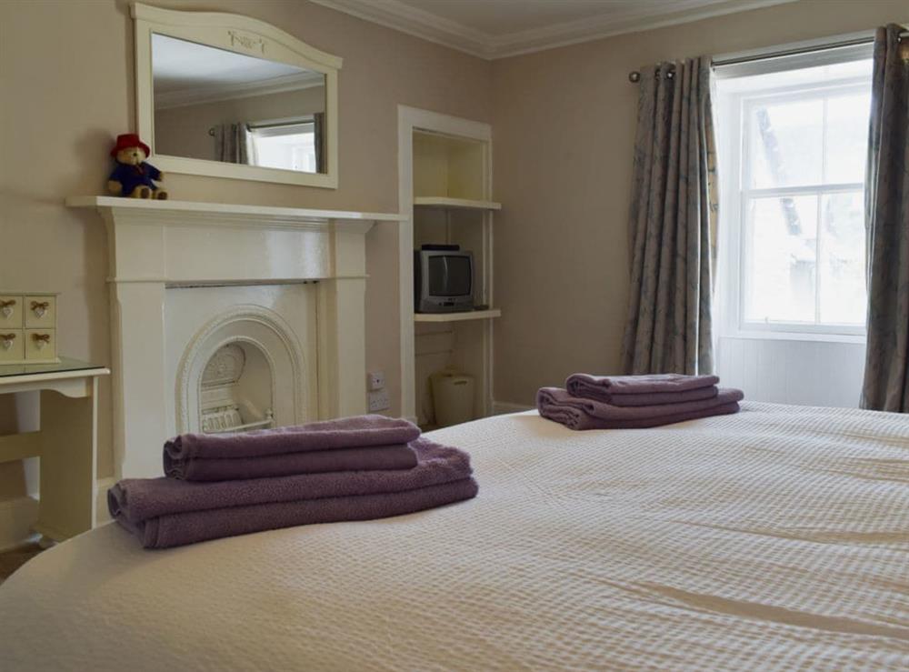 Comfortable bedroom with zip and link super kingsize bed (photo 2) at Toad Hall in Aberfeldy, Perthshire