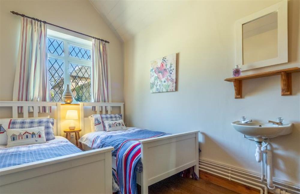 Ground floor: Bedroom three with twin beds at Toad Hall, Burnham Deepdale near Kings Lynn