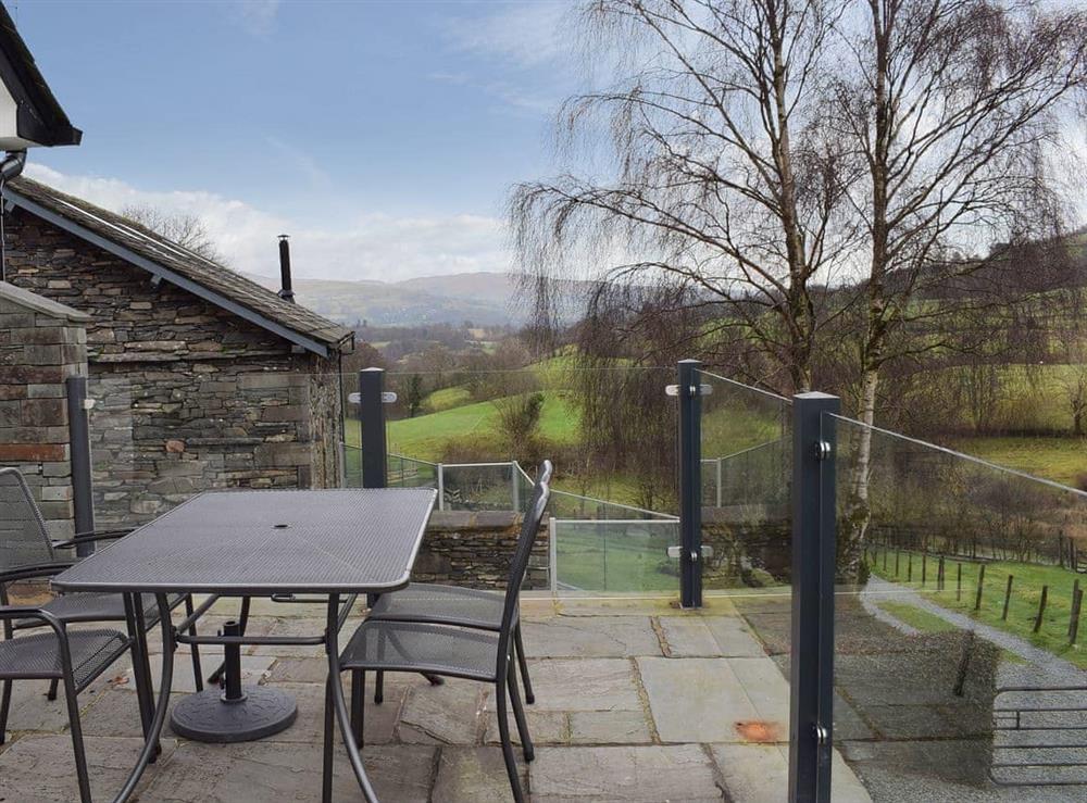 Balcony with large table for alfresco dining at Tock How View in Outgate, Hawkshead, Cumbria., Great Britain