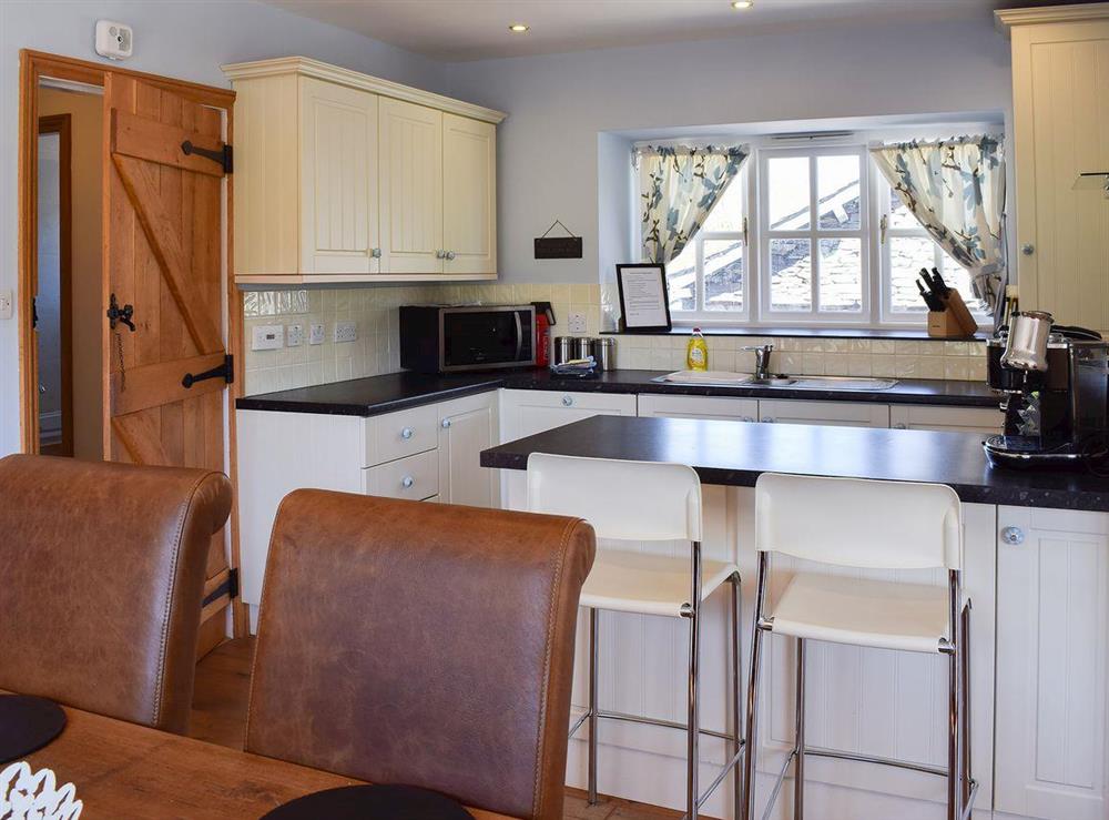 Dining area situated close to kitchen area at Tock How View in Outgate, Hawkshead, Cumbria., Great Britain
