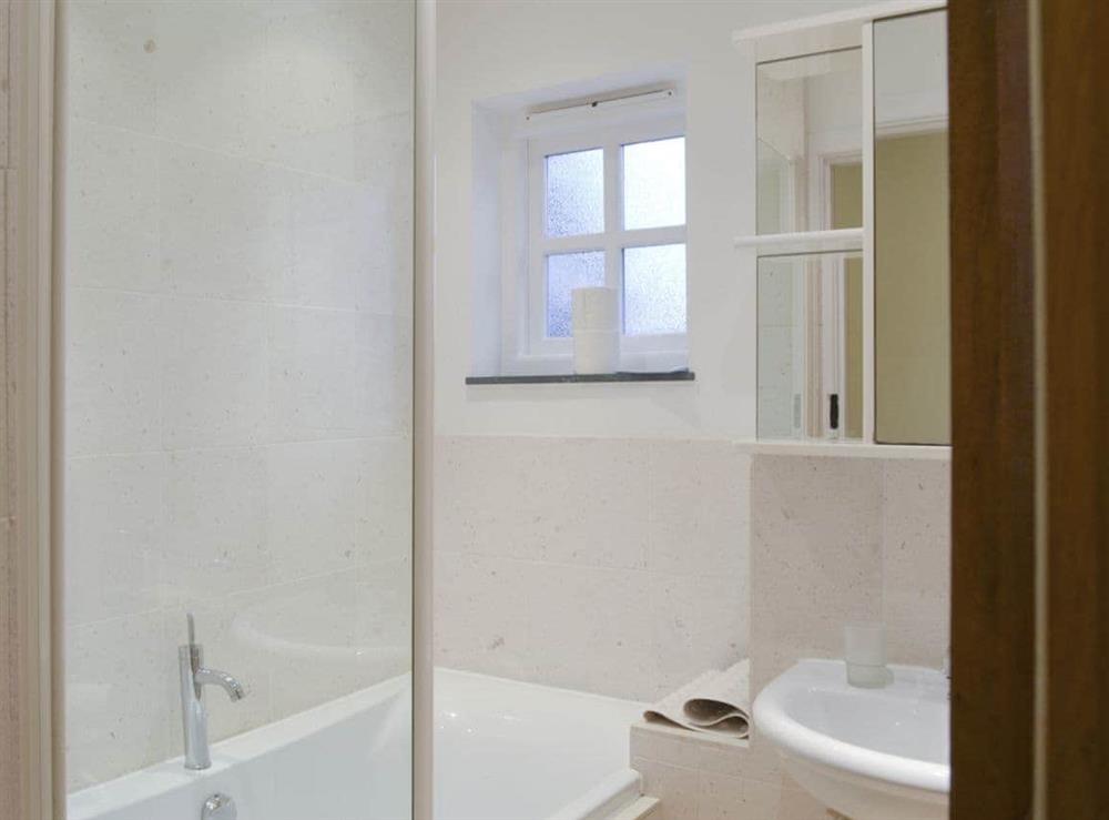 Family bathroom with shower over bath at Tock How View in Outgate, Hawkshead, Cumbria., Great Britain