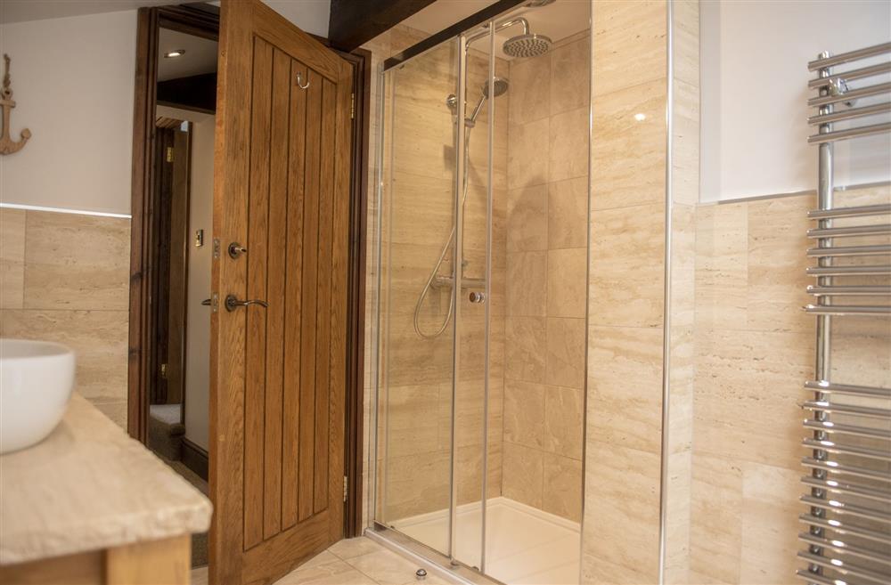 The large walk-in shower in the family bathroom at Tockwith Lodge Barn, York