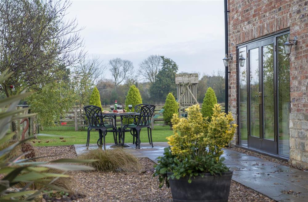 The outdoor seating in the spacious garden at Tockwith Lodge Barn, York