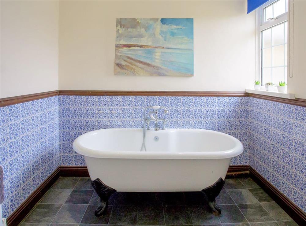 Bathroom with roll-top bath at Todburn East in Todburn, near Rothbury, Northumberland, England
