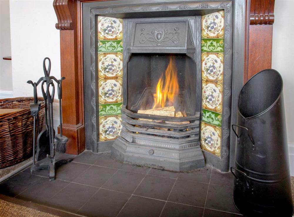 Charming open fire in the living room at Todburn East in Todburn, near Rothbury, Northumberland, England