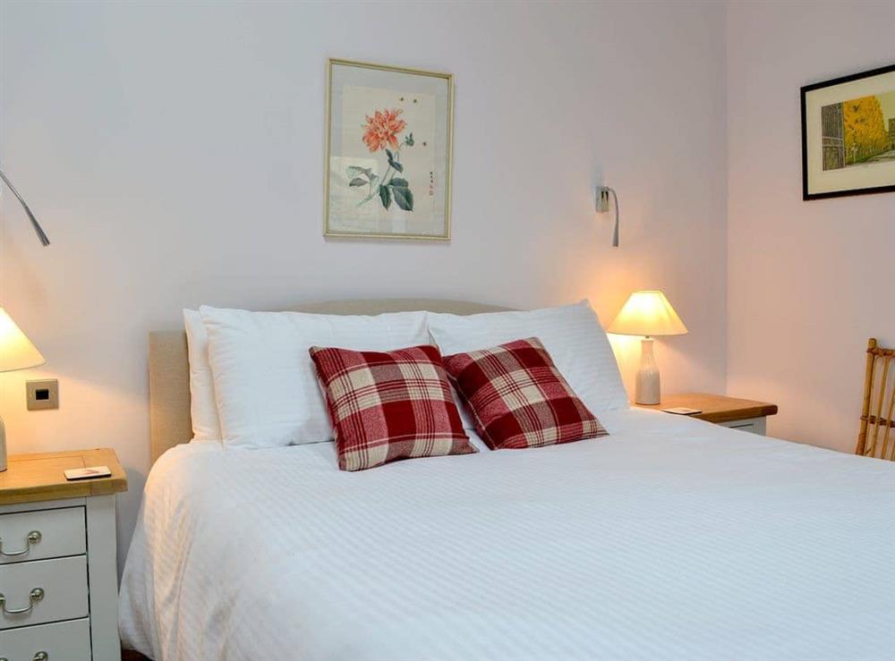 Comfortable kingsize bed and quality furnishings at Todd Fell Cottage, 