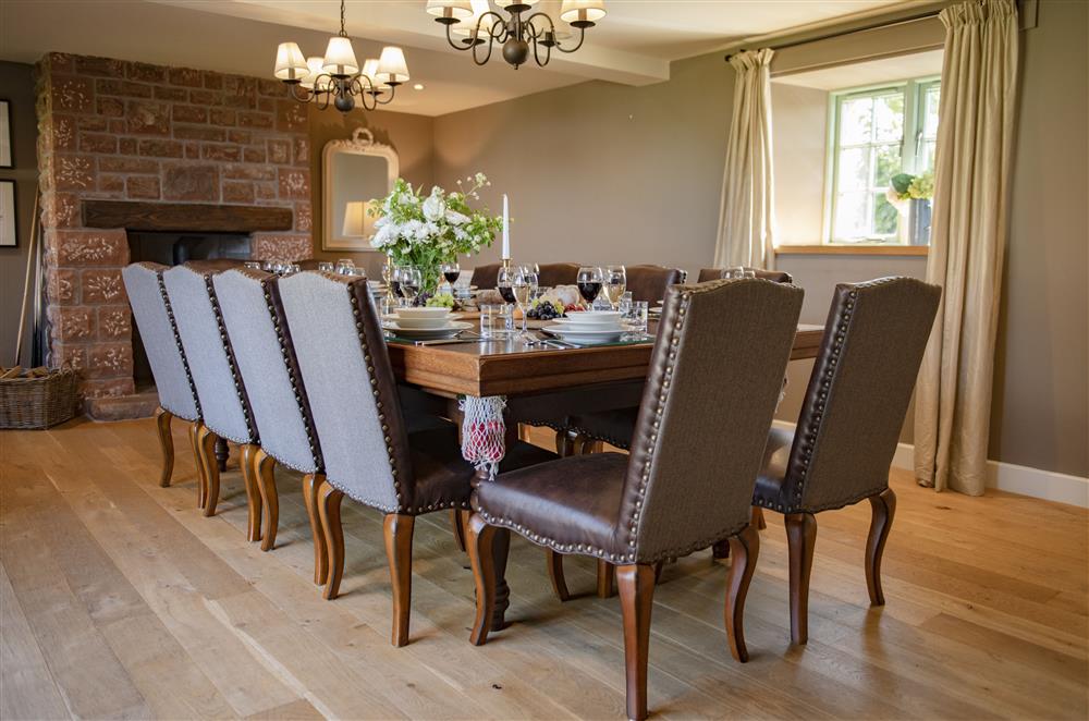 Exquisite dining room with table seating twelve guests which can be converted to a half size snooker table