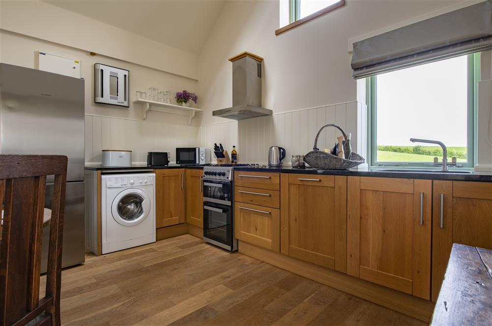 Open-plan fully-equipped kitchen at Todd Hills Hall Farmhouse and Vale Croft, Melmerby