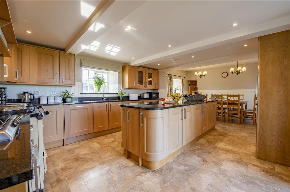 Spacious kitchen with large breakfast table at Todd Hills Hall Farmhouse and Vale Croft, Melmerby