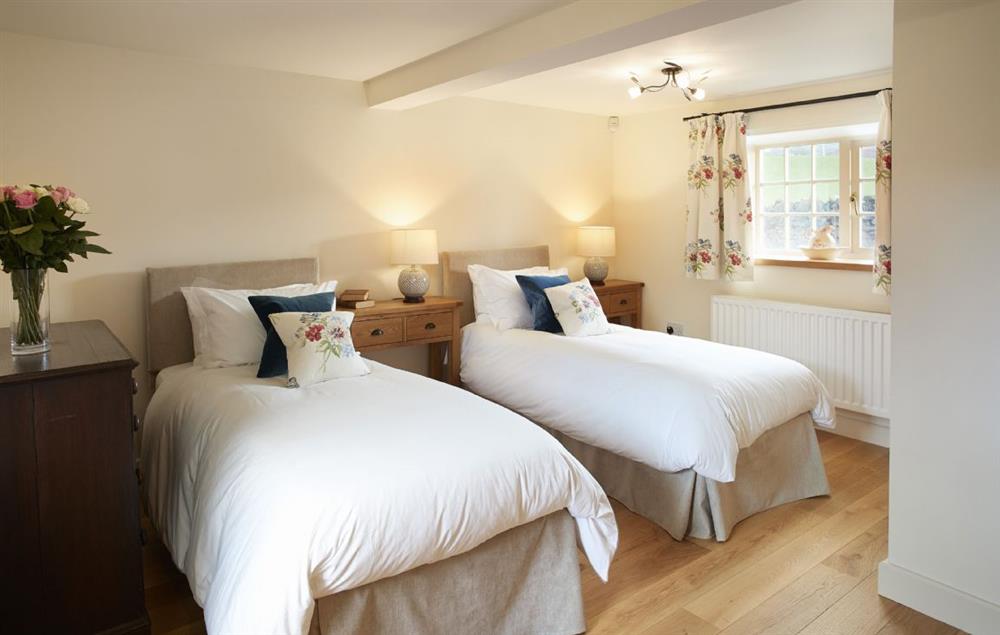 Bedroom 6 with 6’ zip and link double bed and en-suite shower room at Todd Hills Hall Farmhouse, Melmerby