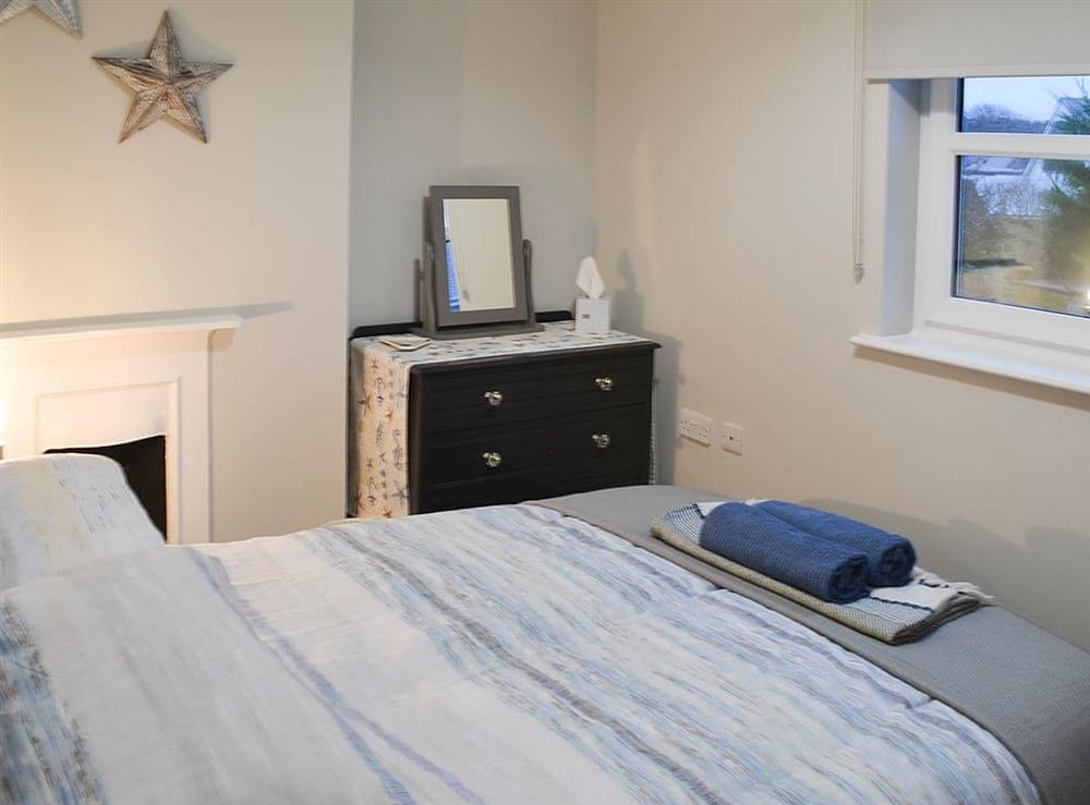 Welcoming double bedroom at Tolcarne Retreat in Newquay, Cornwall